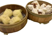 Bamboo steamers filled with bao and dumplings