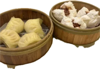 Bamboo steamers filled with bao and dumplings